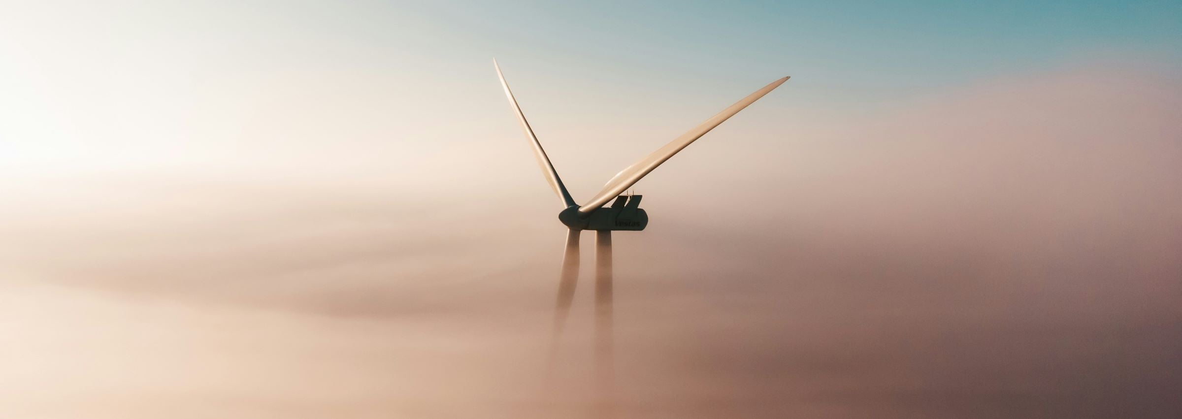 wind-turbine-through-clouds